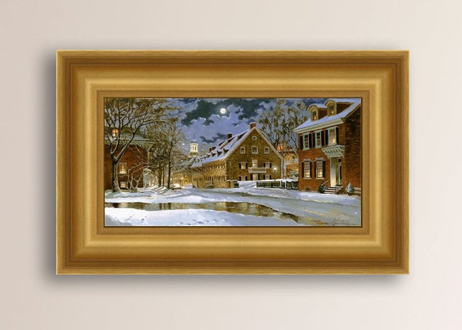 Snowy Bethlehem scene with Moravian Church at night.