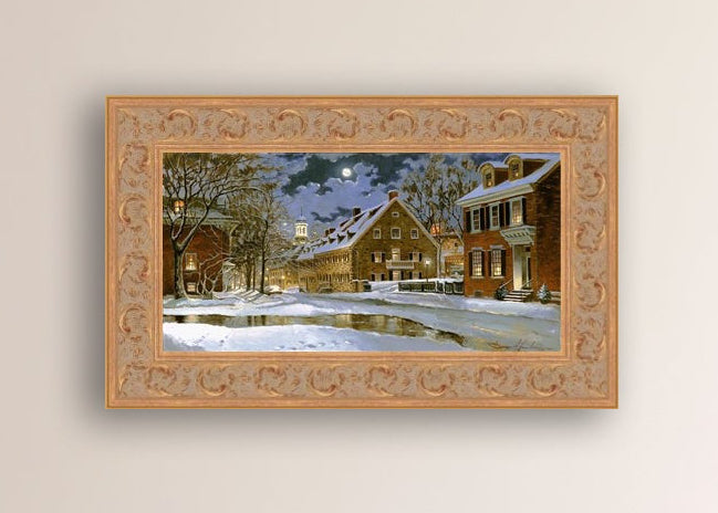 Snowy Bethlehem scene with Moravian Church at night.