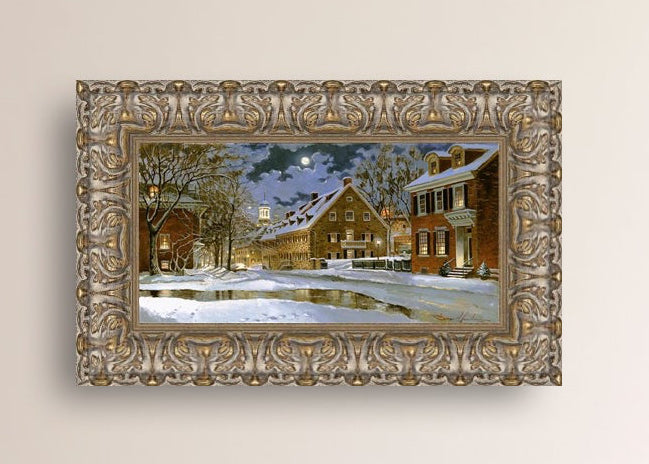 Snowy Bethlehem scene with Moravian Church at night.