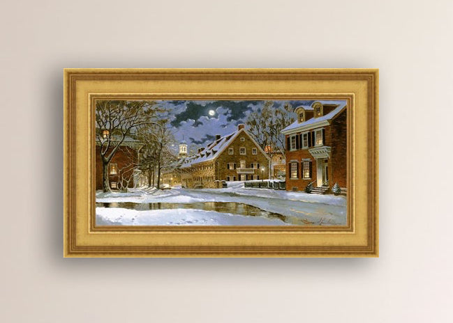 Snowy Bethlehem scene with Moravian Church at night.