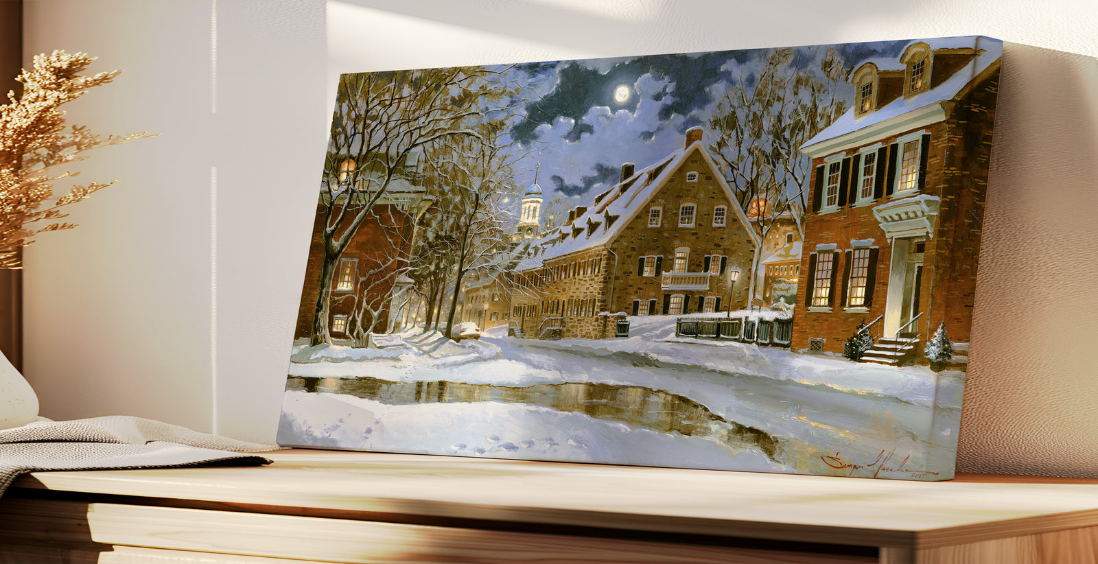 Snowy Bethlehem scene with Moravian Church at night.
