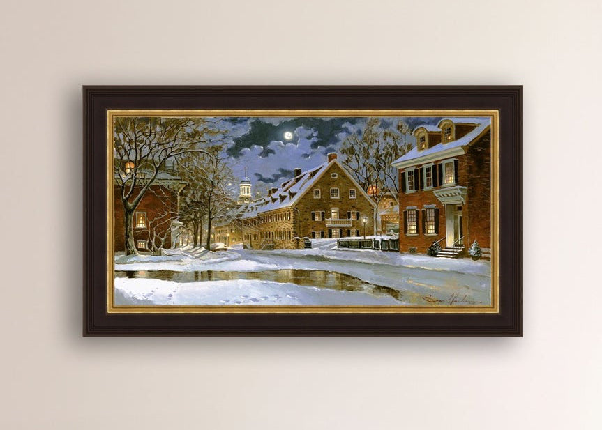 Snowy Bethlehem scene with Moravian Church at night.