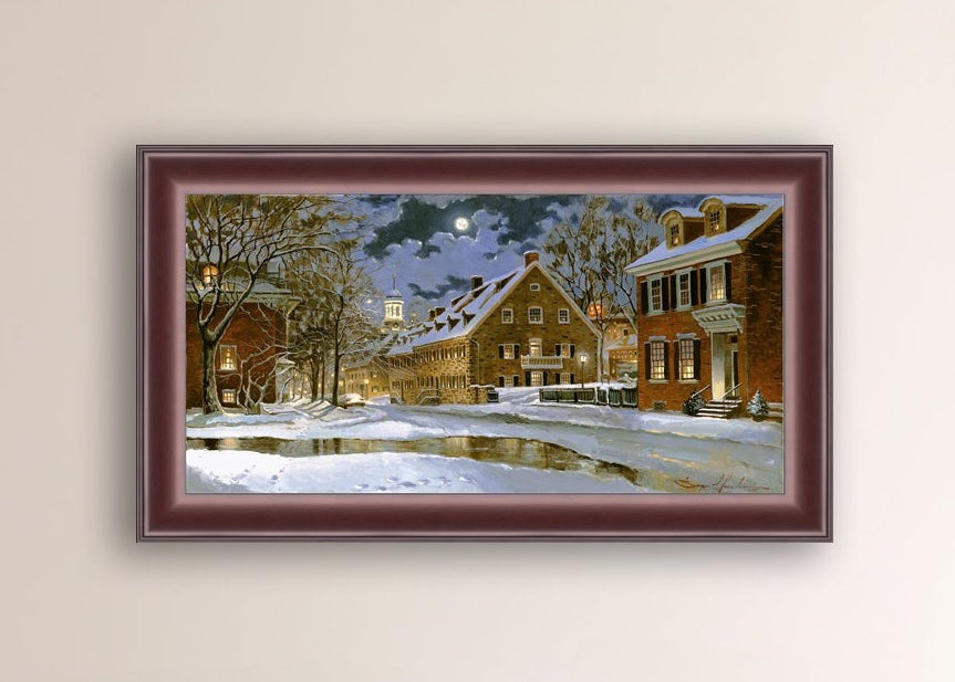 Snowy Bethlehem scene with Moravian Church at night.