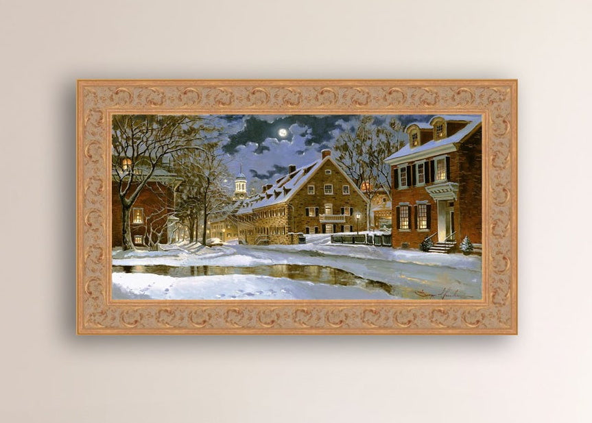 Snowy Bethlehem scene with Moravian Church at night.