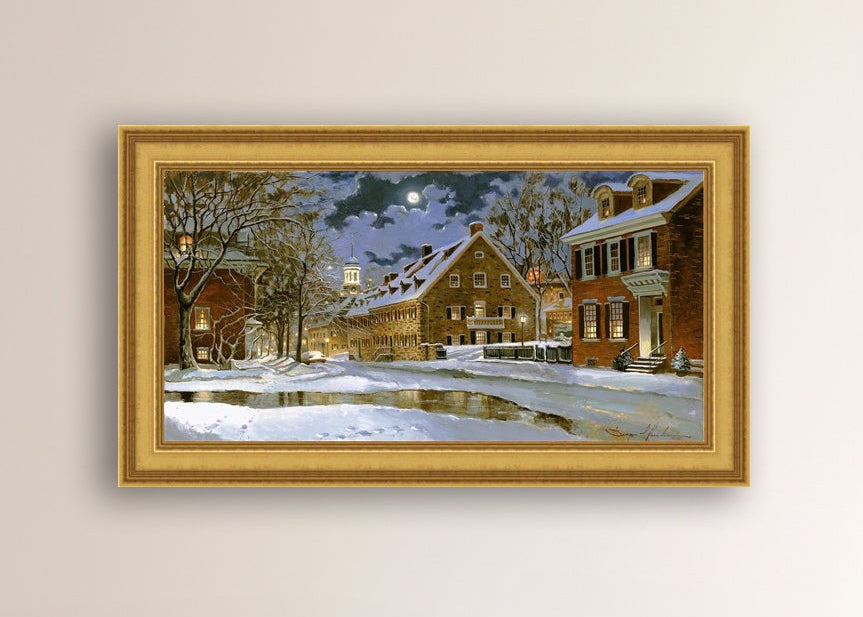 Snowy Bethlehem scene with Moravian Church at night.