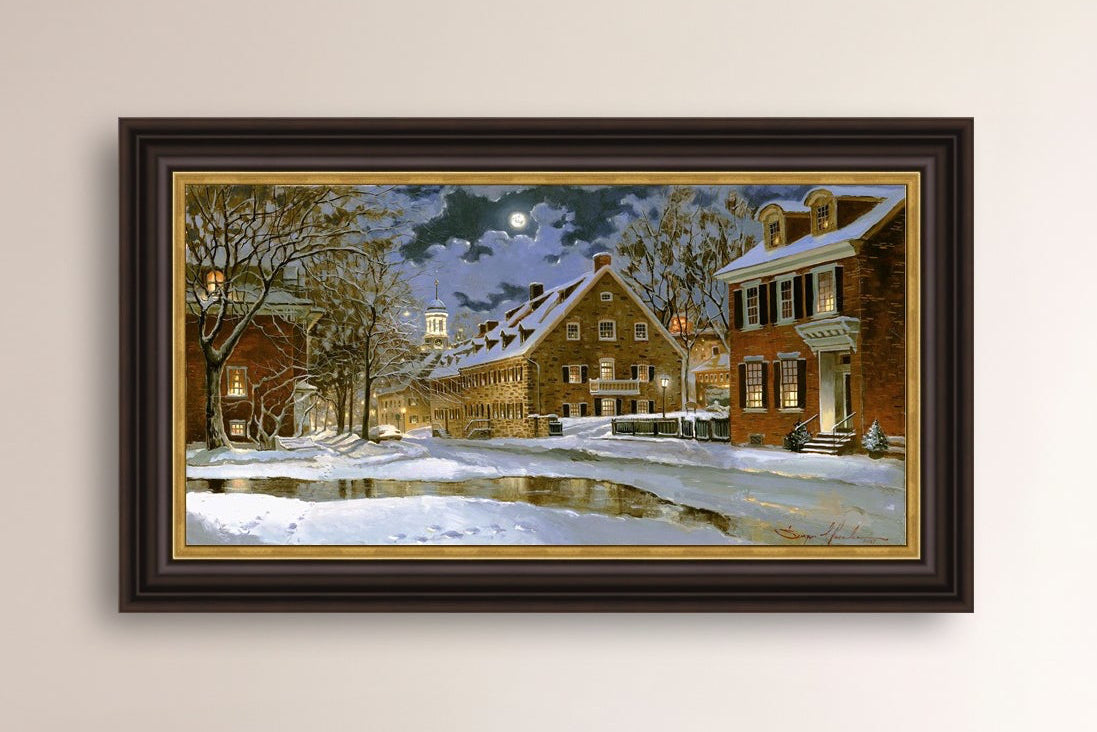 Snowy Bethlehem scene with Moravian Church at night.
