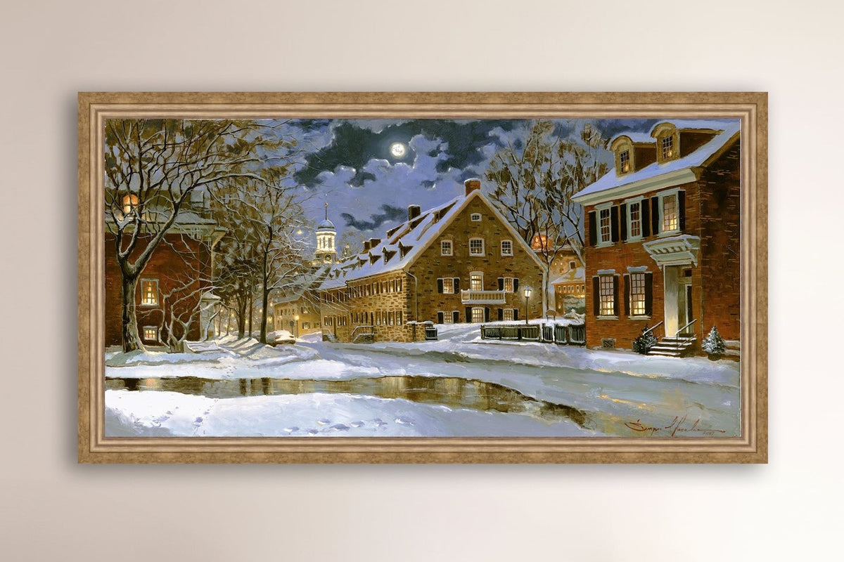 Snowy Bethlehem scene with Moravian Church at night.