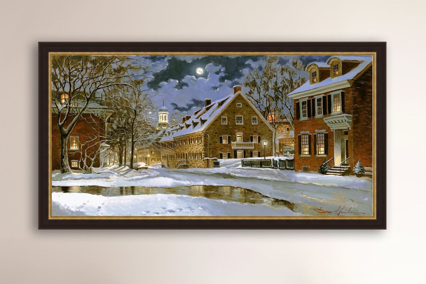 Snowy Bethlehem scene with Moravian Church at night.