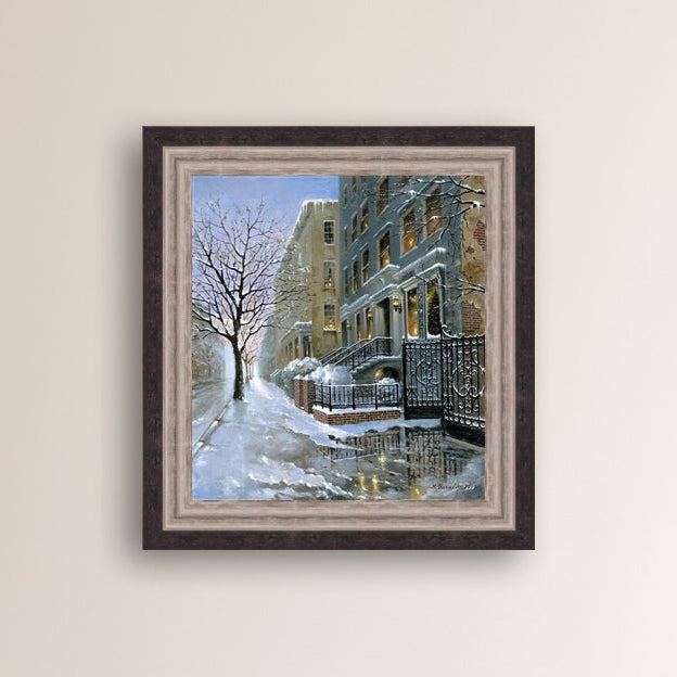 Snowy 82nd street in New York with a brownstone  building entrance and Christmas Tree in the window.
