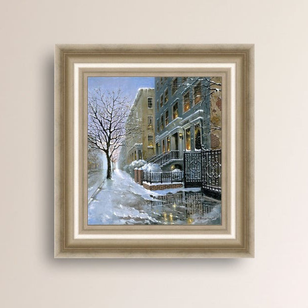 Framed artwork of snowy 82nd street in New York with a brownstone  building entrance and Christmas Tree in the window.