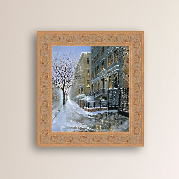 Framed Snowy 82nd street in New York with a brownstone  building entrance and Christmas Tree in the window.