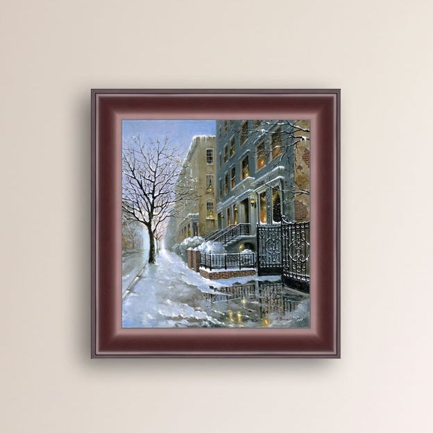Framed Snowy 82nd street in New York with a brownstone  building entrance and Christmas Tree in the window.