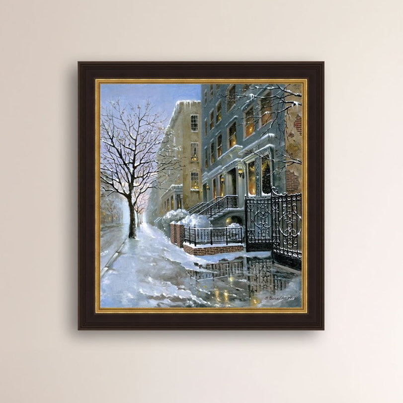 Framed artwork of snowy 82nd street in New York with a brownstone  building entrance and Christmas Tree in the window.