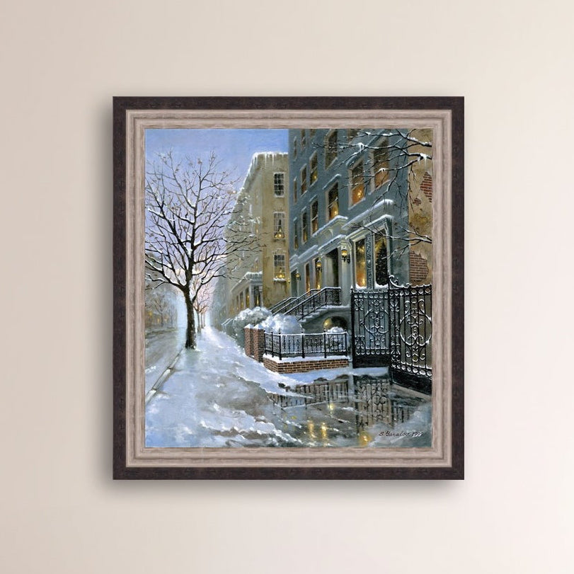Framed artwork of snowy 82nd street in New York with a brownstone  building entrance and Christmas Tree in the window.