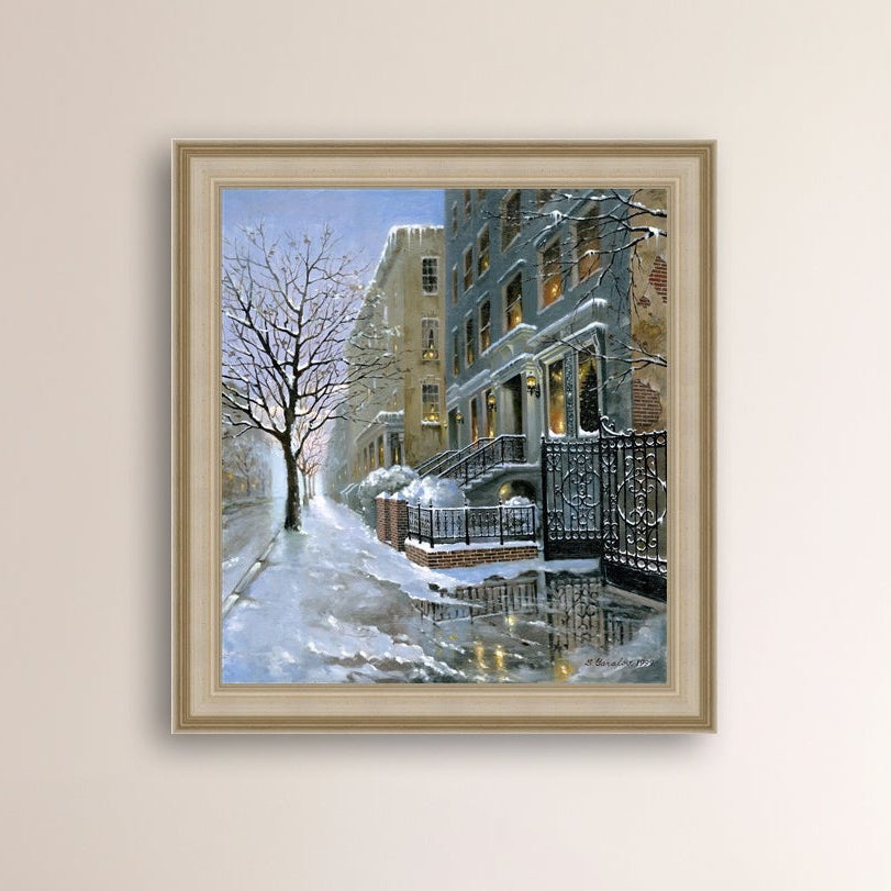 Framed artwork of snowy 82nd street in New York with a brownstone  building entrance and Christmas Tree in the window.