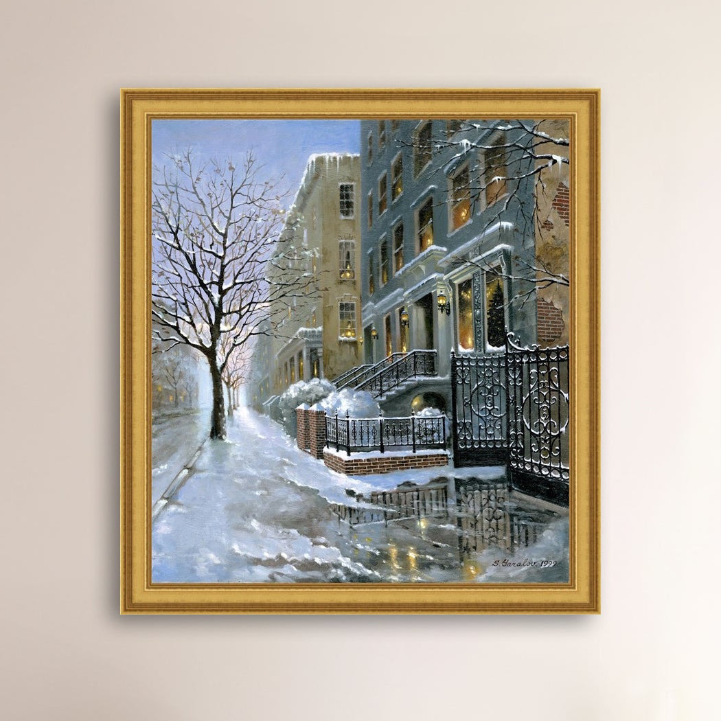 Framed artwork of snowy 82nd street in New York with a brownstone  building entrance and Christmas Tree in the window.