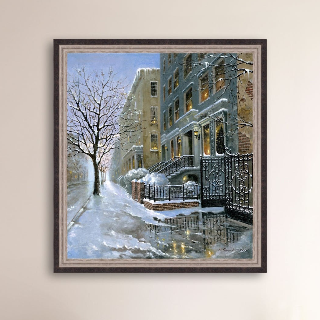 Framed artwork of snowy 82nd street in New York with a brownstone  building entrance and Christmas Tree in the window.