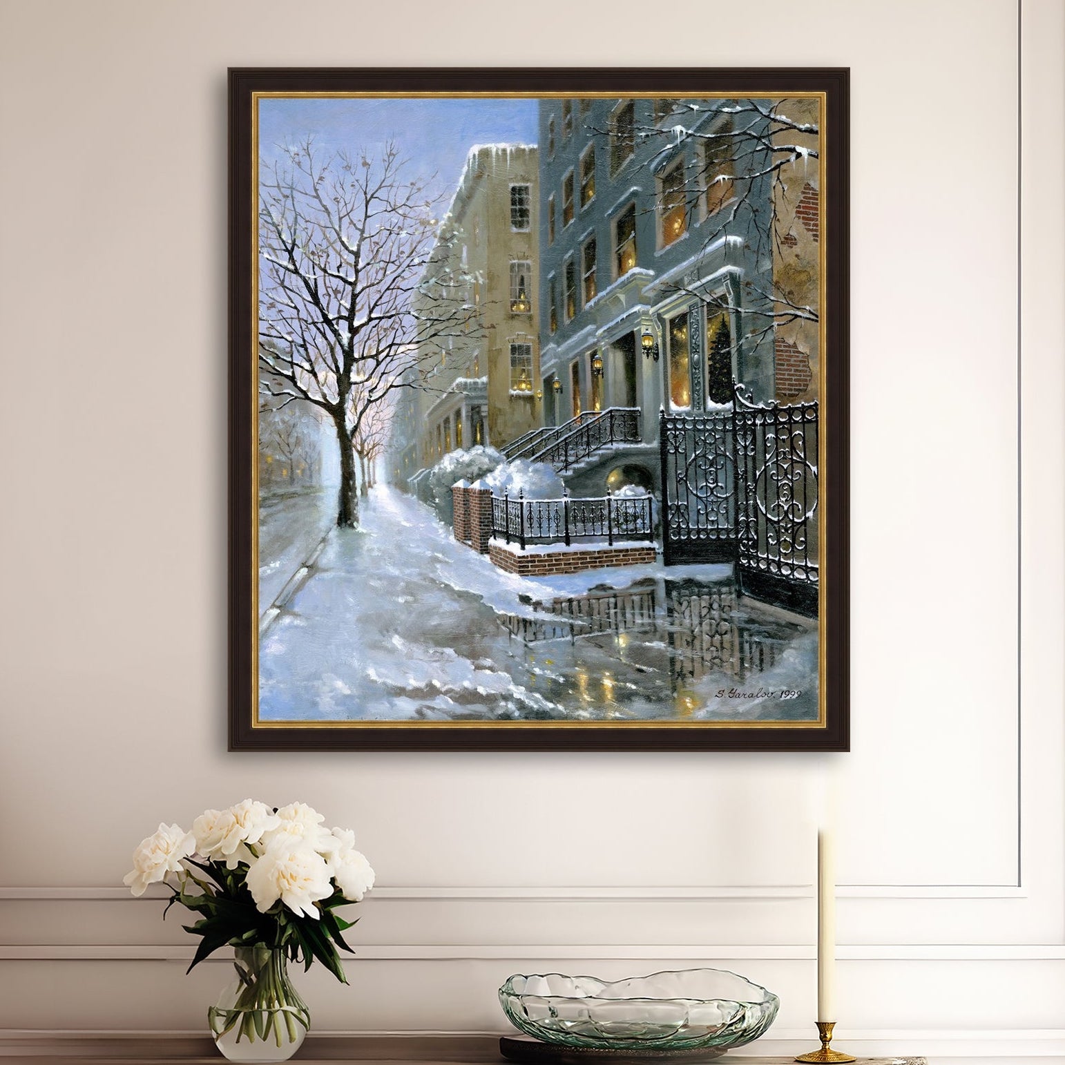 Framed artwork of snowy 82nd street in New York with a brownstone  building entrance and Christmas Tree in the window.