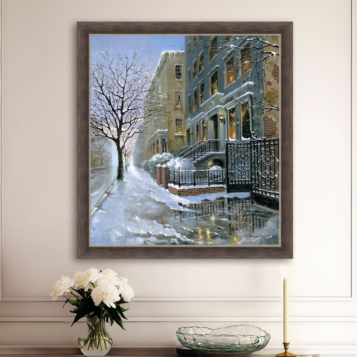 Snowy 82nd street in New York with a brownstone  building entrance and Christmas Tree in the window.