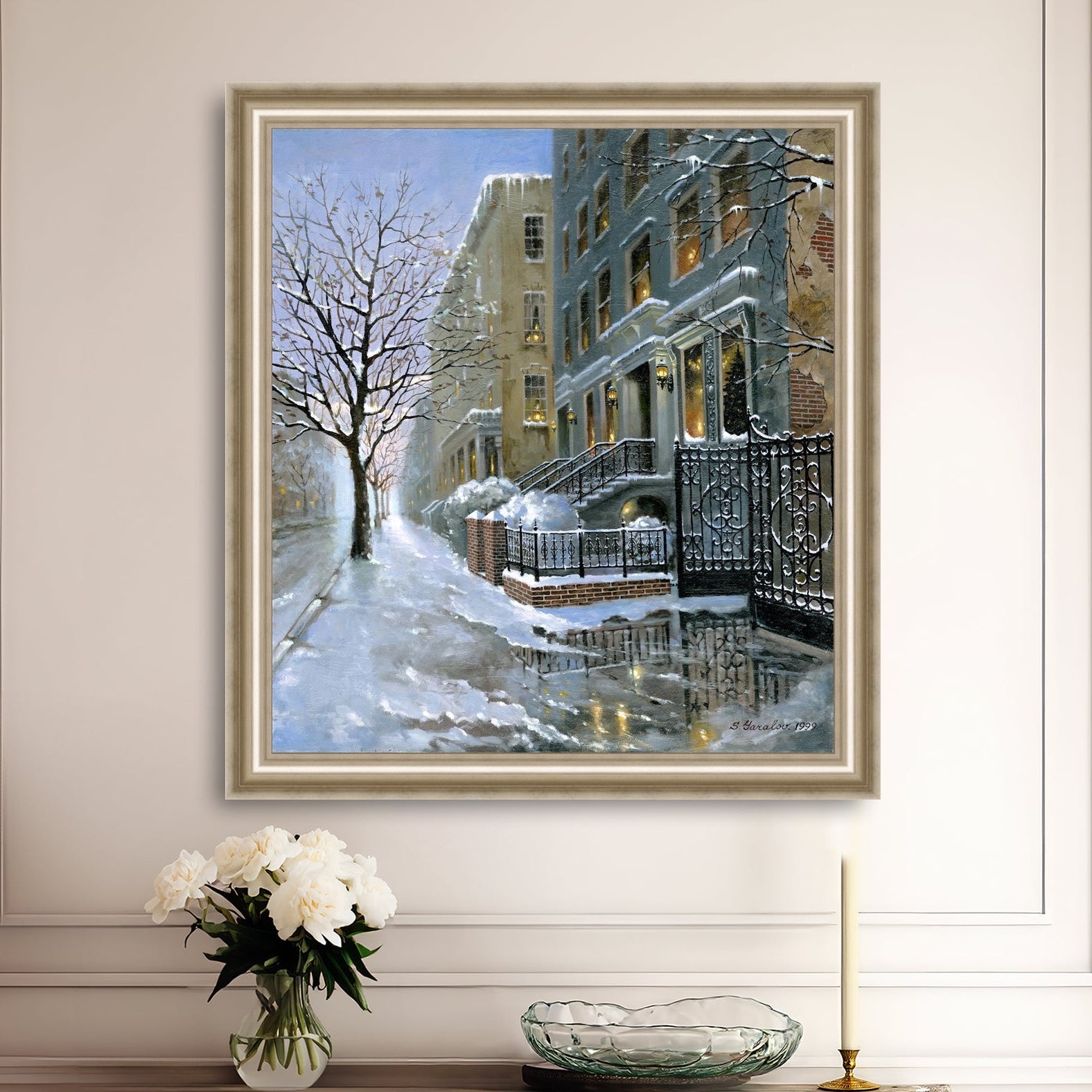 Framed artwork of snowy 82nd street in New York with a brownstone  building entrance and Christmas Tree in the window.
