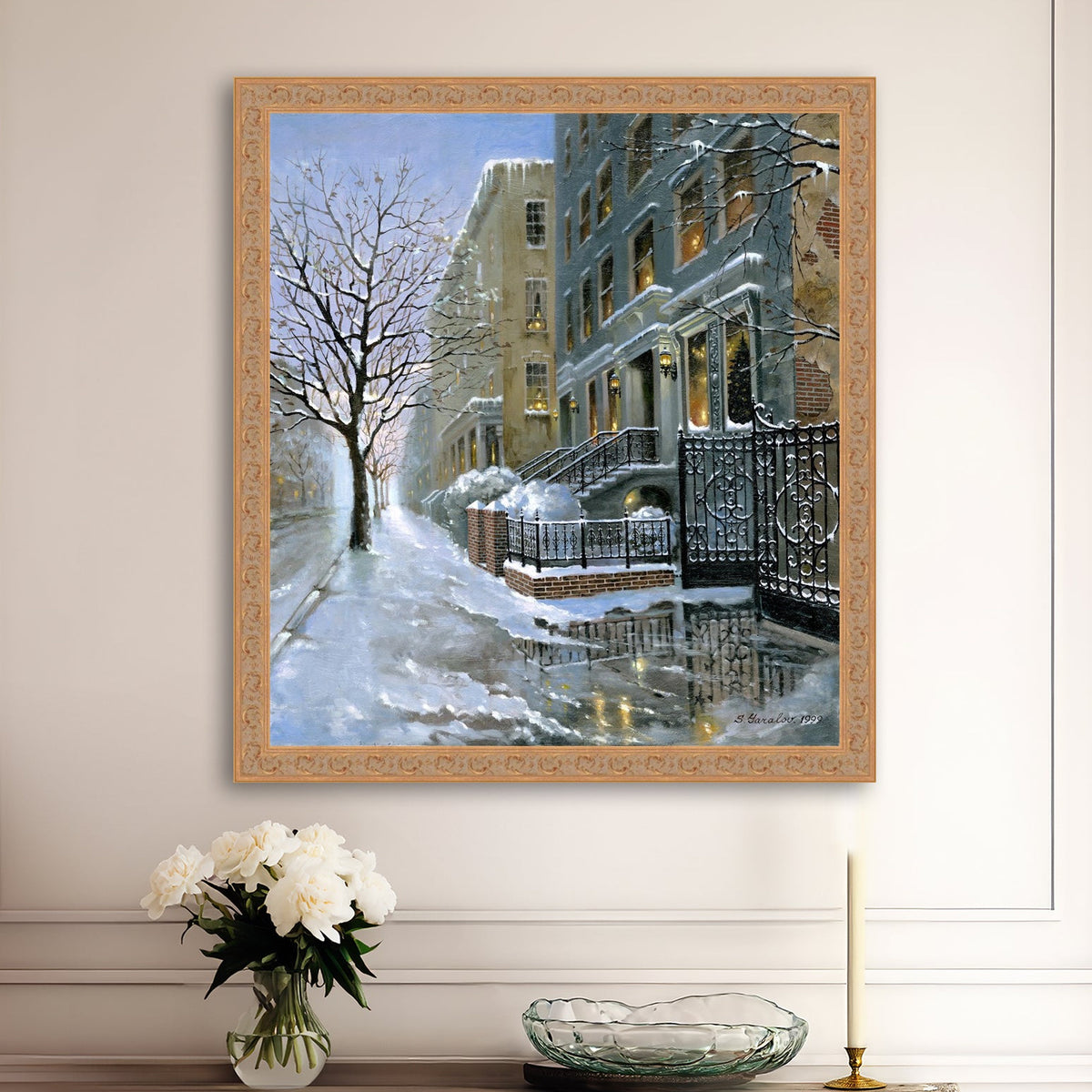 Framed artwork of snowy 82nd street in New York with a brownstone  building entrance and Christmas Tree in the window.