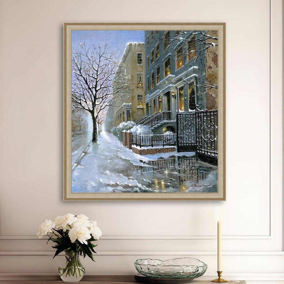 Framed artwork of snowy 82nd street in New York with a brownstone  building entrance and Christmas Tree in the window.